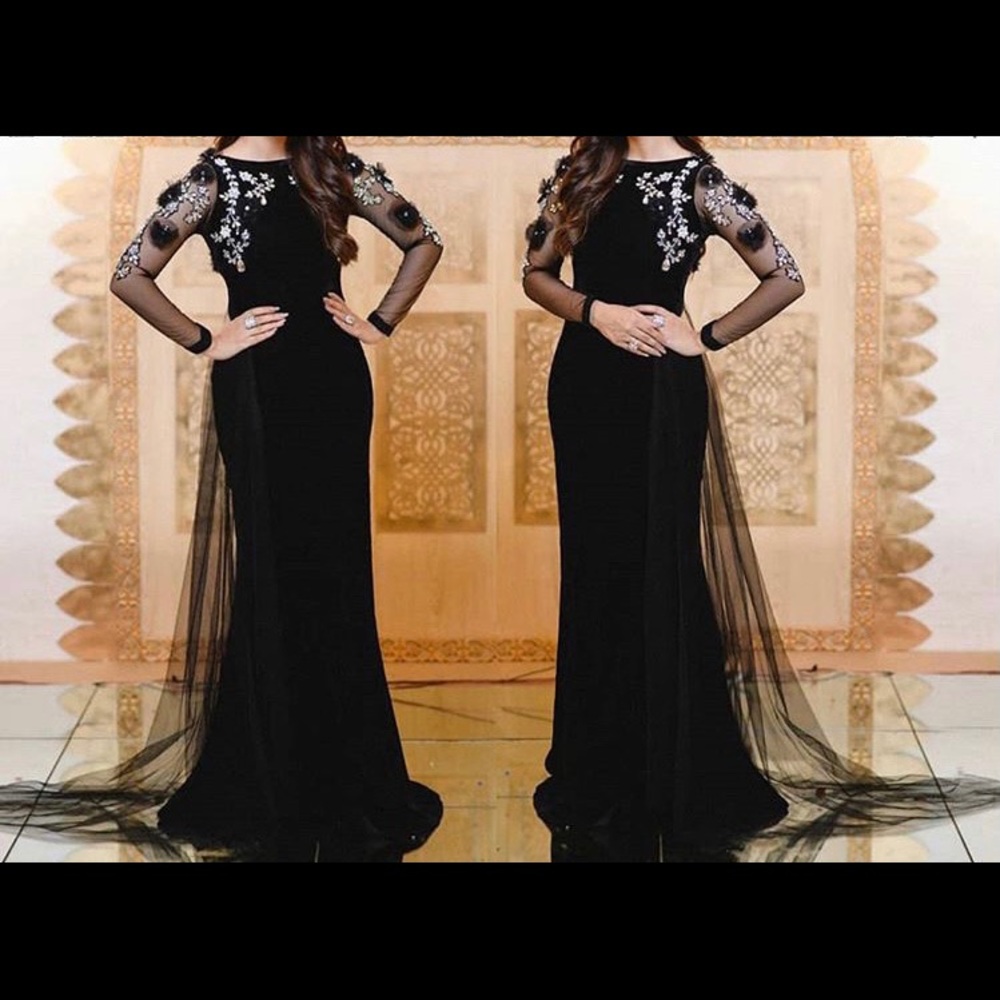 Woman black dress with hand work on it